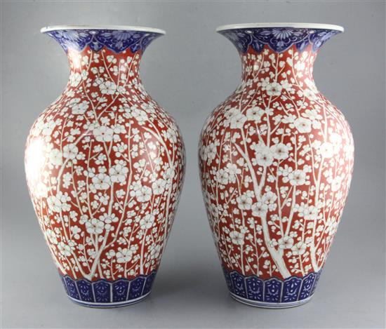 A pair of large Japanese Imari vases, Meiji period h. 46cm, one repaired